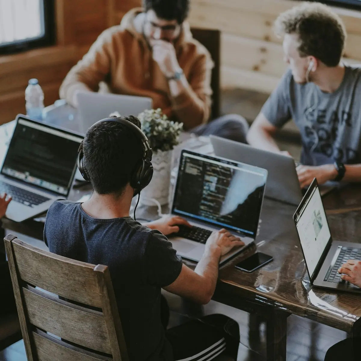 Agency team collaborating around a table