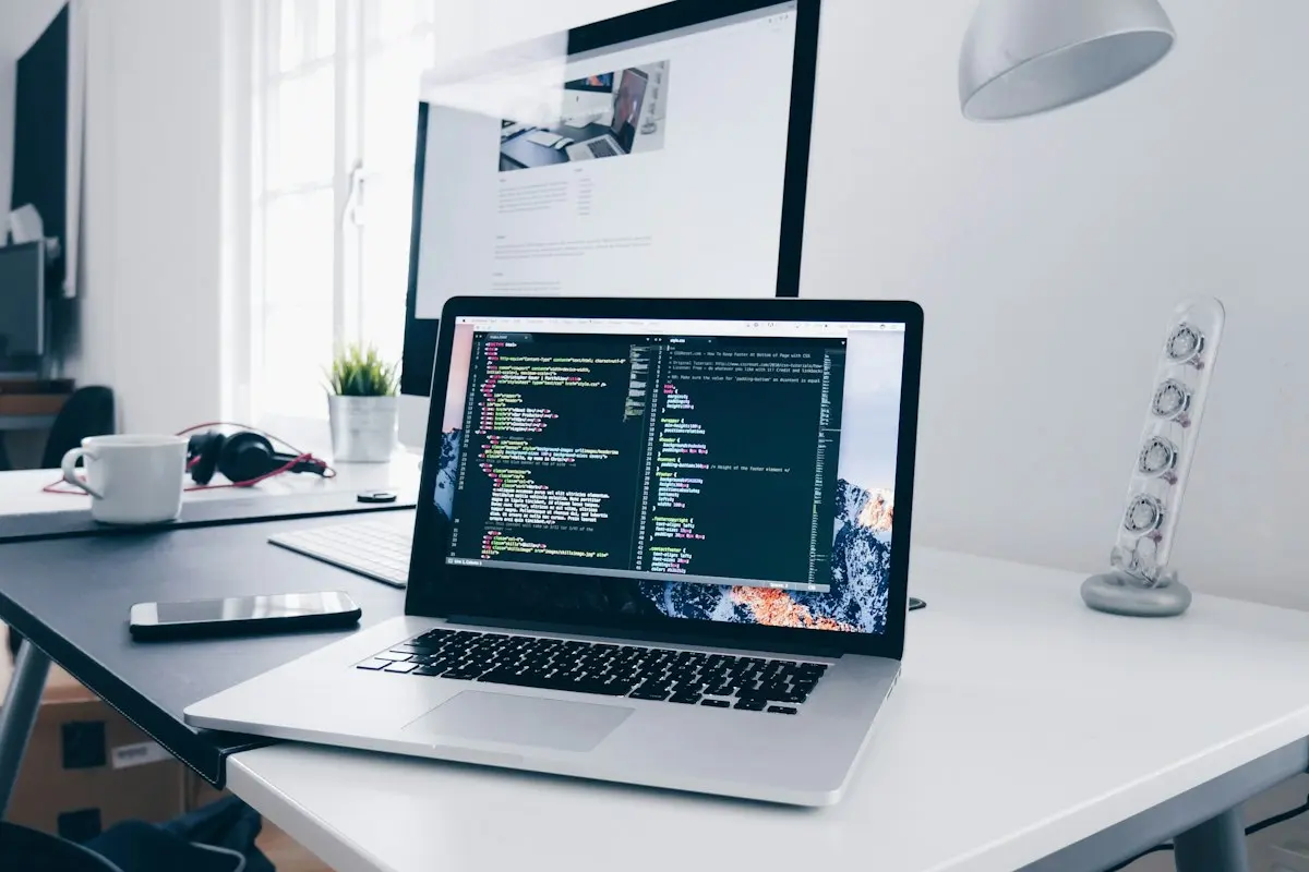 Laptop with a web development workspace